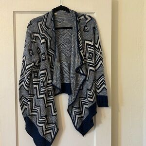 Francesca’s colorful open sweater